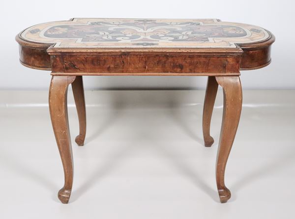 Tuscan walnut living room table with a rectangular shaped shape, with an antique 17th century marble top with various polychrome inlays