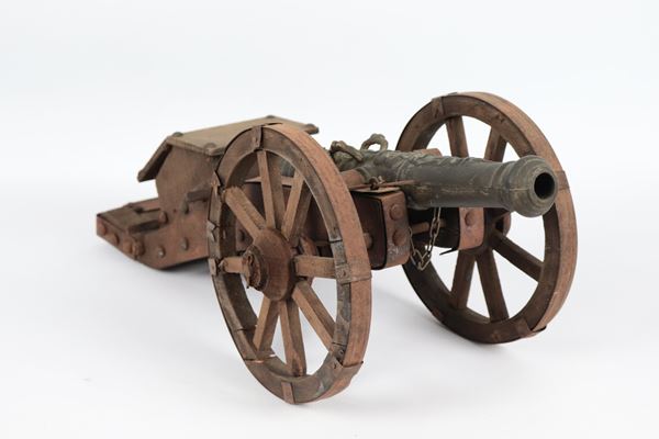 Model of a 17th century cannon in bronze and wood