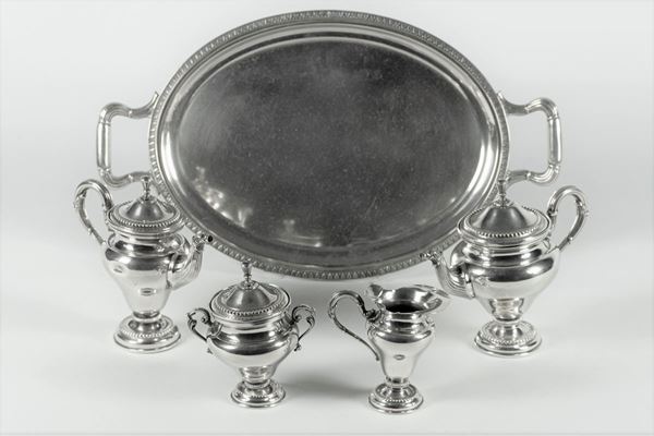 Coffee service in embossed silver with Empire motifs