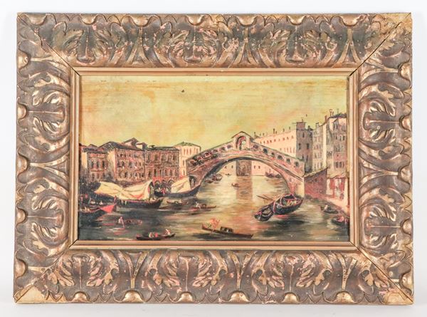 Scuola Italiana Inizio XX Secolo - "Veduta del ponte di Rialto a Venezia", piccolo dipinto ad olio su tavoletta in cornice in legno dorato e intagliato
