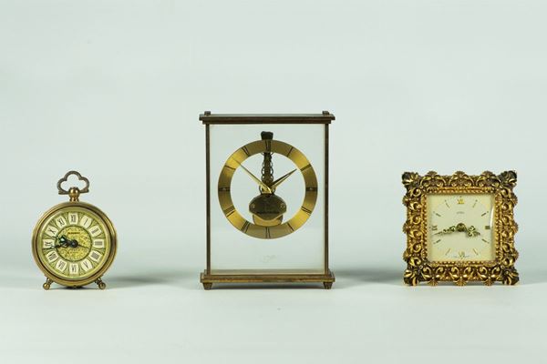 Three table alarm clocks