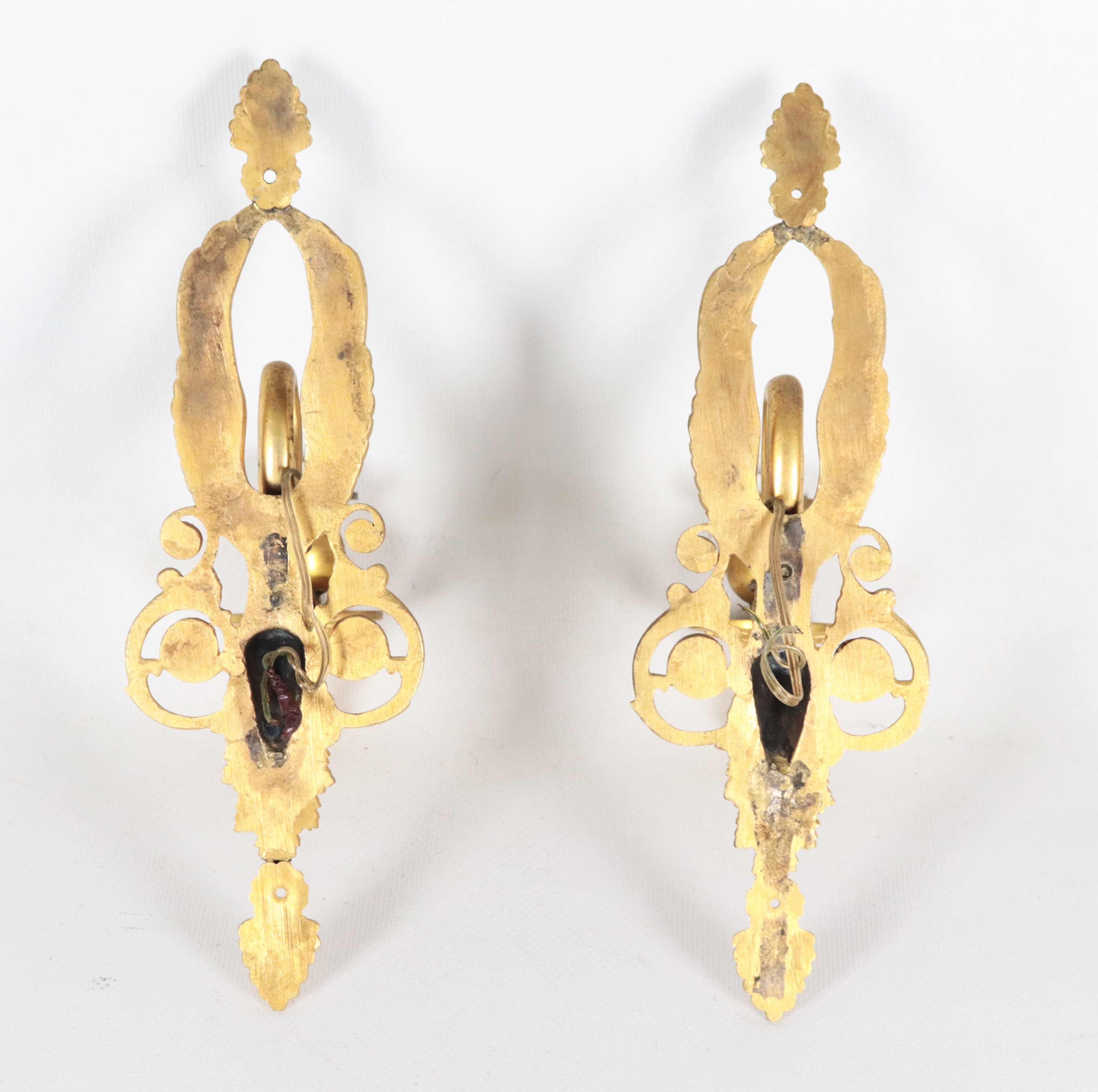 Coppia di appliques francesi Impero in bronzo dorato