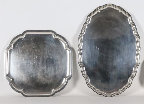 Lot of two large silver metal serving plates