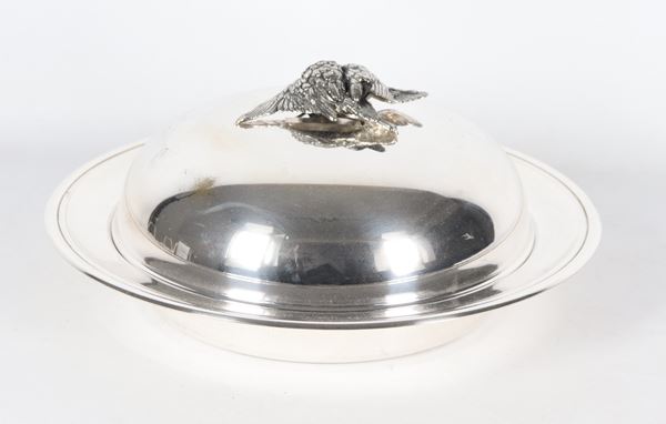Silver metal game vegetable dish with baking dish inside
