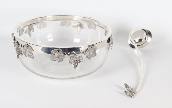 Large glass punch bowl with ladle and silver metal rim with embossed bunches of grapes