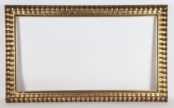 Gilded and carved wooden frame