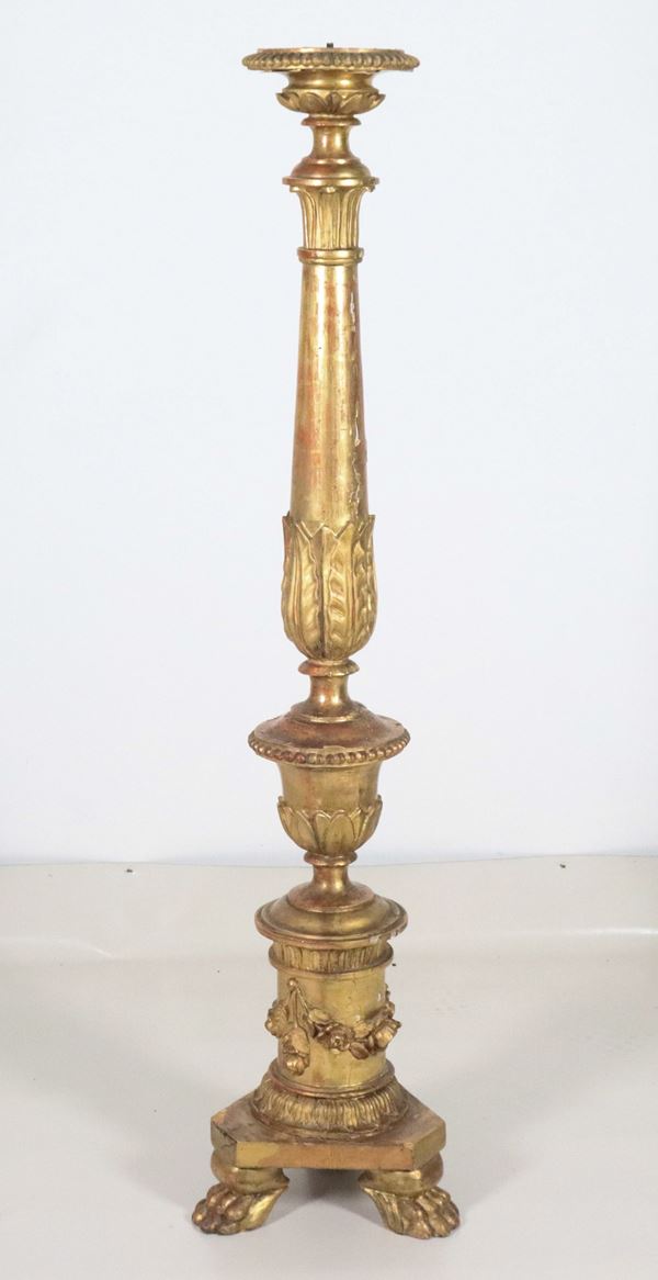Floor torch holder in gilded wood and carved with Louis XVI motifs