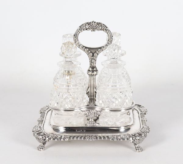 Cruet in argento con quattro ampolle in cristallo molato, gr. 420
