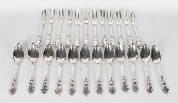 Lot of twelve spoons and twelve forks in embossed silver (24 pcs), gr. 680