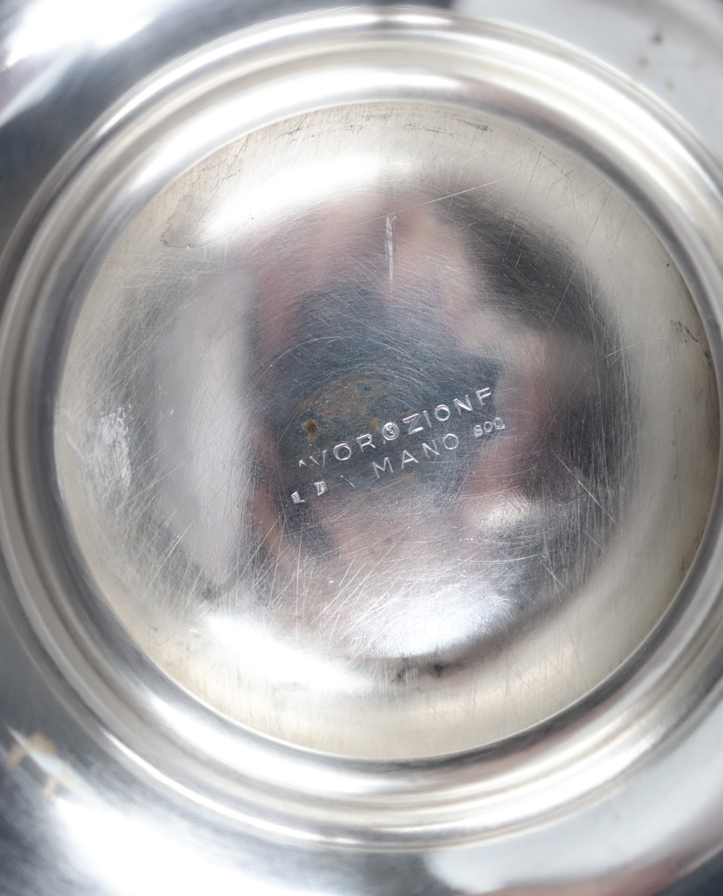 Brocca in argento con manico ricurvo, gr. 720