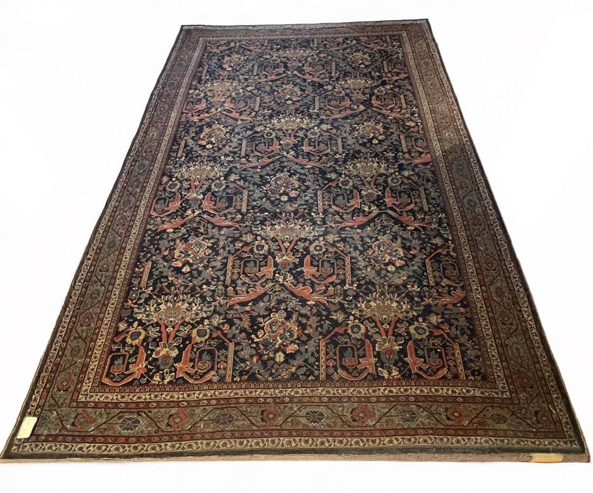 Tappeto persiano Farahan a disegni floreali, geometrici e arabesque su fondo blu M. 5 x 3,30