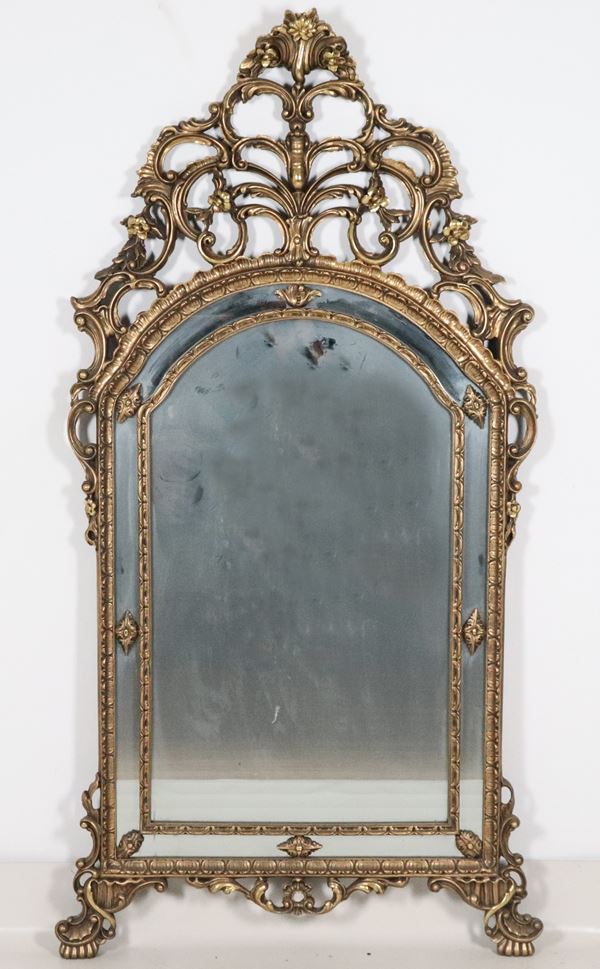 Louis XV style mirror in gilded and carved wood