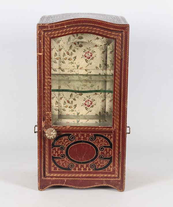 Ancient model of sedan chair, wood covered in decorated and embossed leather