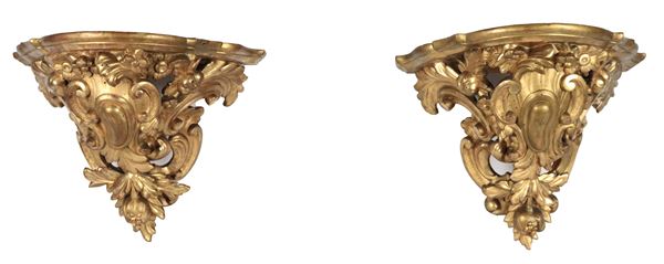 Pair of antique wall brackets in gilded wood and carved with Louis XIV motifs