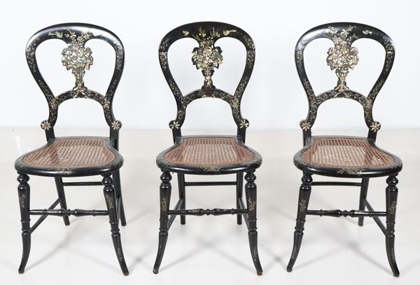 Lot of three chairs in ebonized wood with inlays and mother-of-pearl applications 