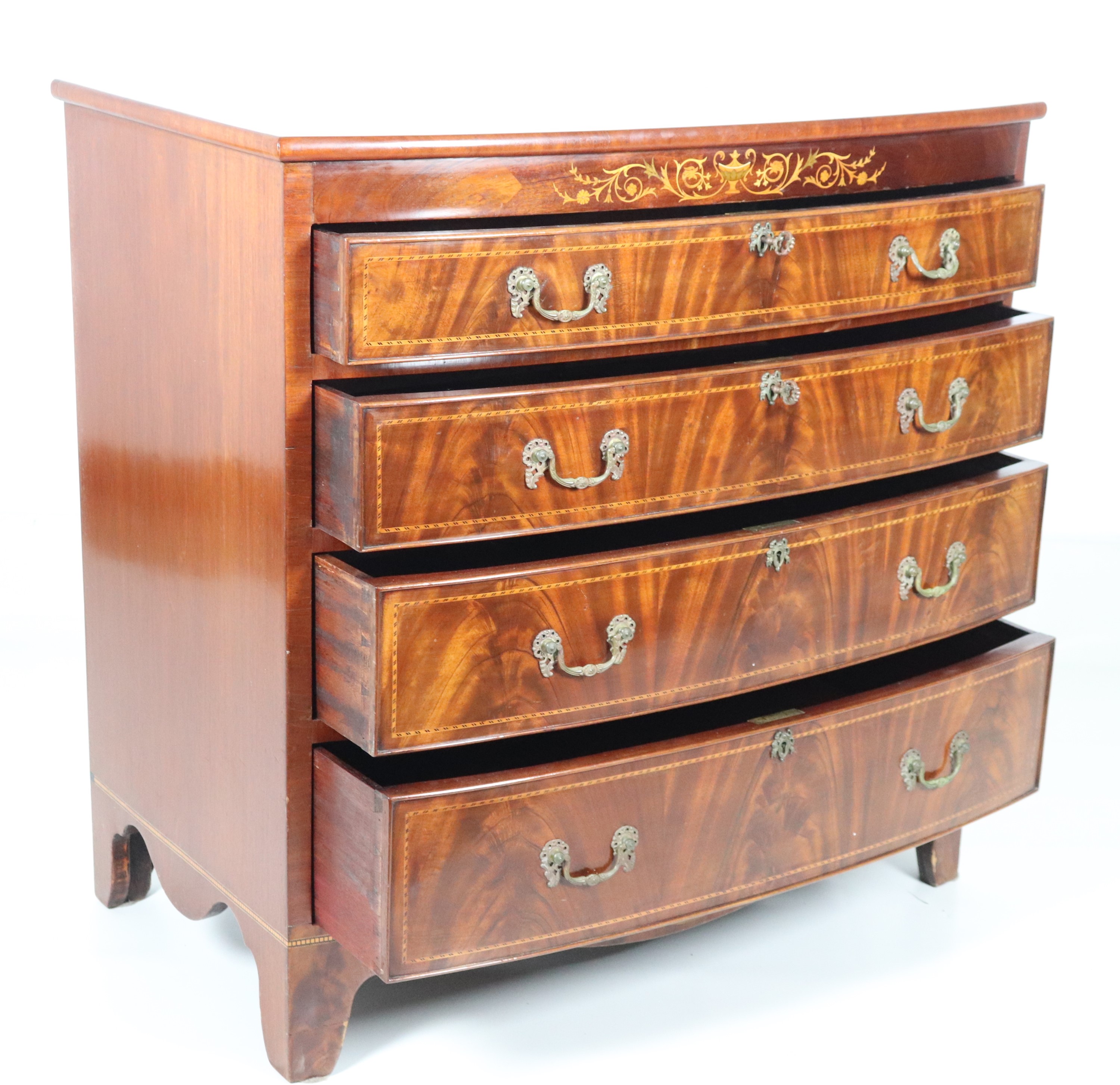 Antico como’ inglese in mogano e piuma di mogano, con intarsi a motivi Sheraton