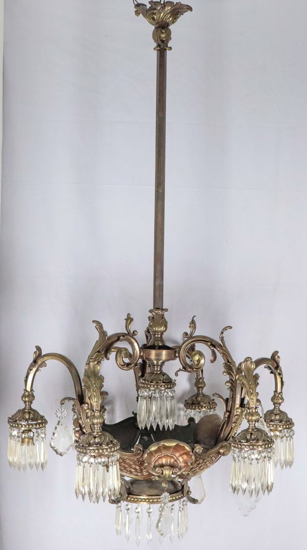 Liberty chandelier in burnished and gilded bronze with crystal prisms, 7 lights