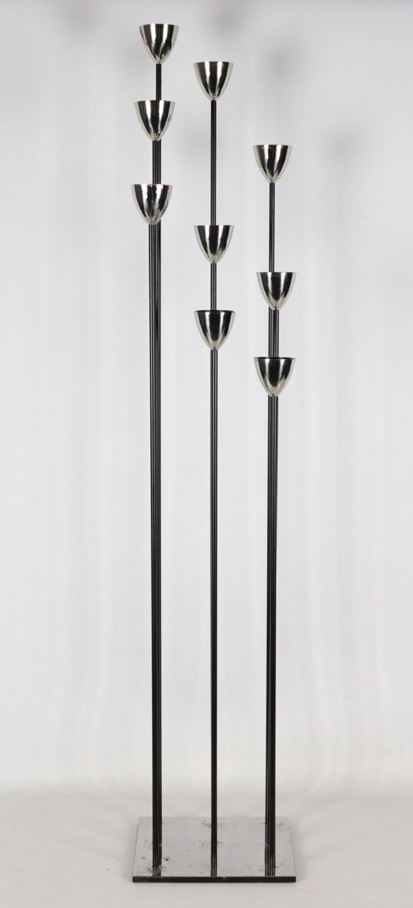 Candle holder with fluted black stems and steel base