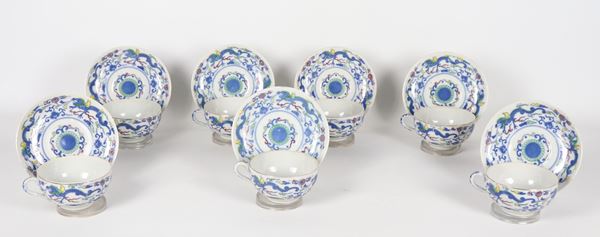 Lot of seven teacups and saucers in Japanese porcelain with polychrome decorations and oriental motifs