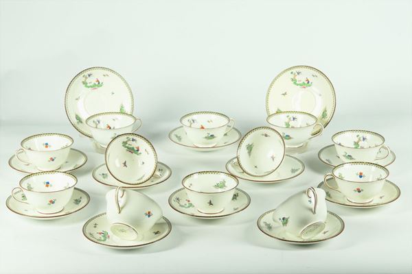 Twelve porcelain teacups with saucers