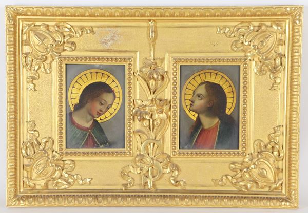 Antica piccola cornice in legno dorato e intagliato con "Ritratti di Santi" all'interno