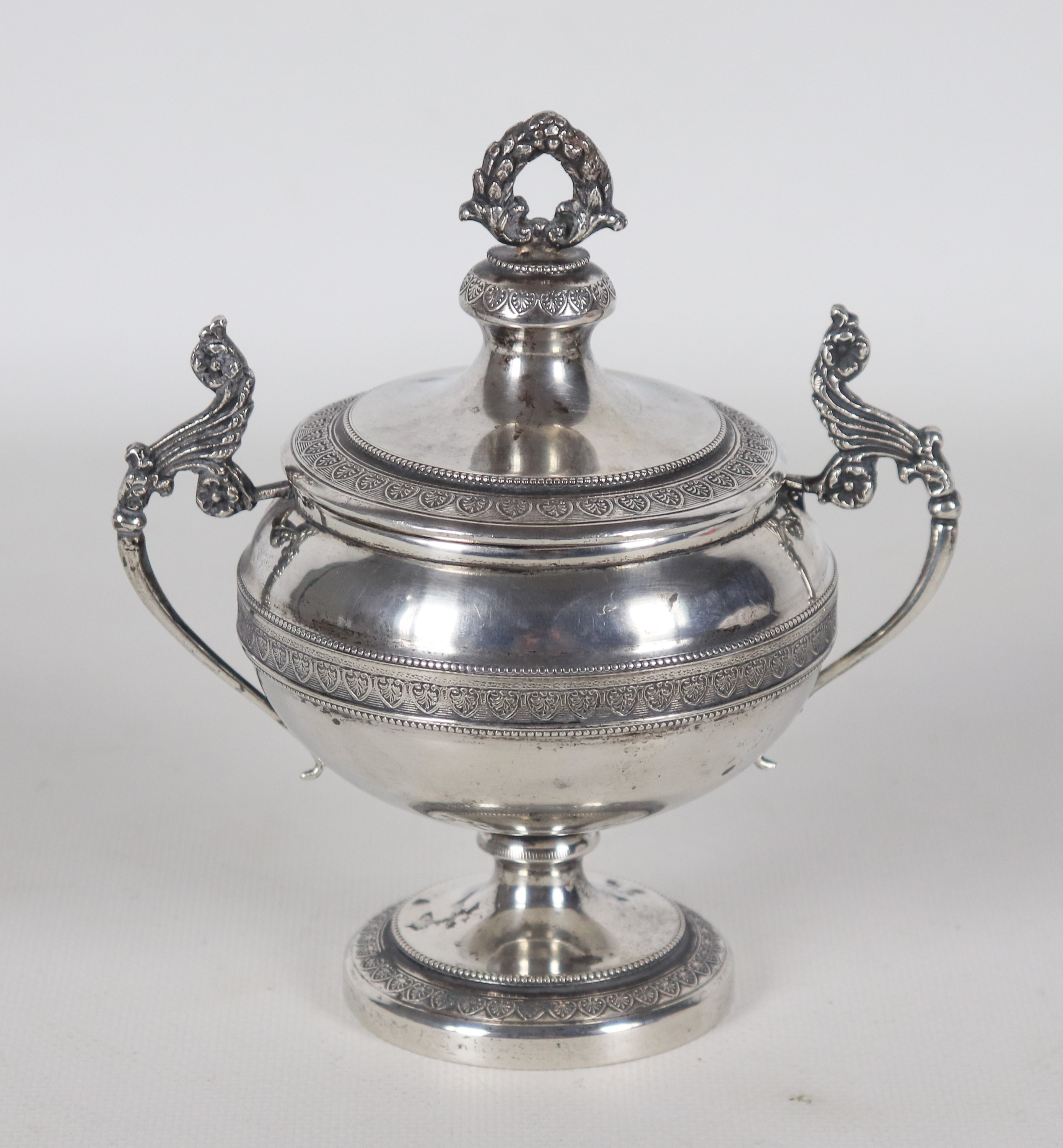 Antica piccola zuccheriera in argento cesellato e sbalzato a motivi Impero, gr. 278
