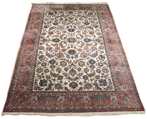 Tappeto persiano Tabriz a disegno floreale su fondo avana e bordo rosso