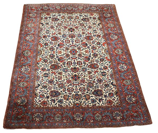 Tappeto persiano Tabriz a disegno floreale su fondo avana e bordo rosso