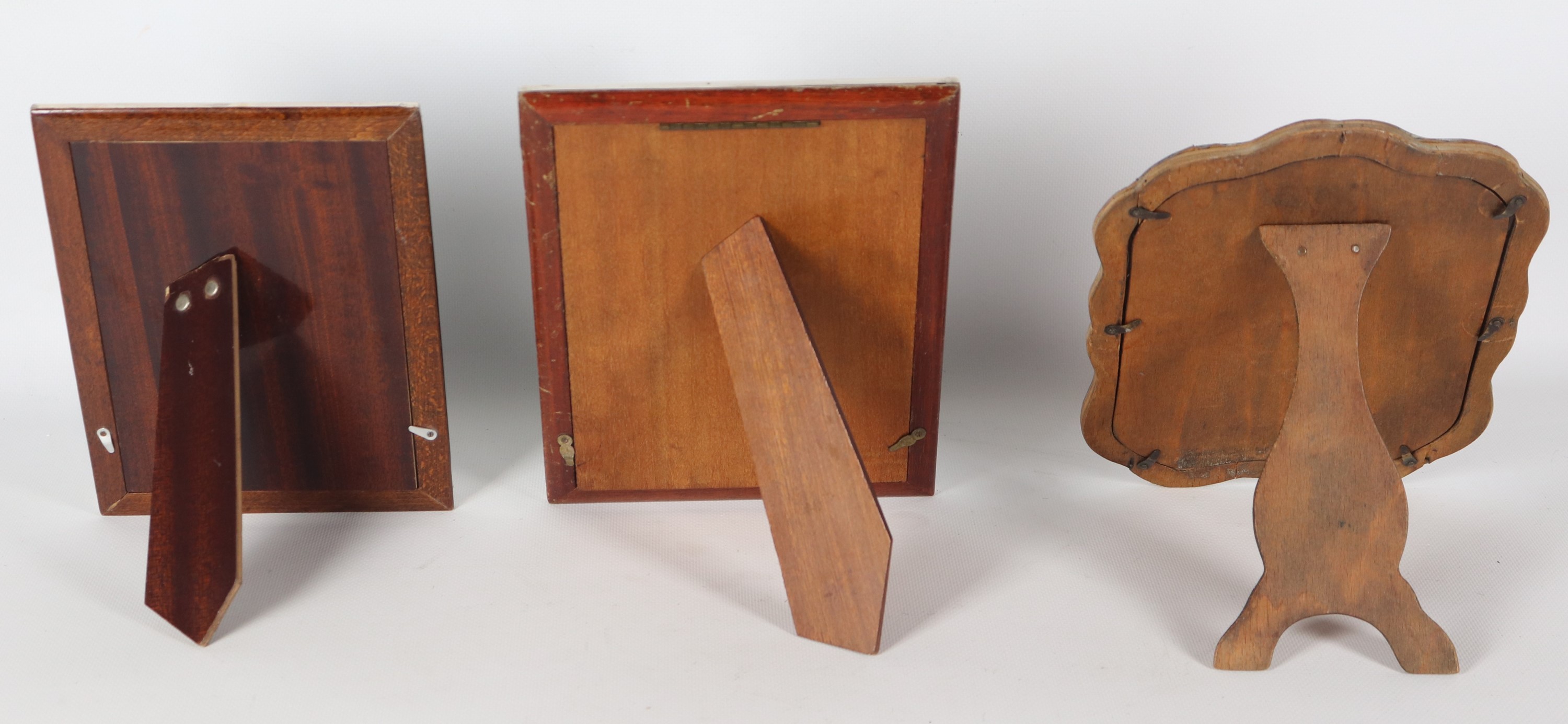 Lotto di tre cornici portaritratti in argento