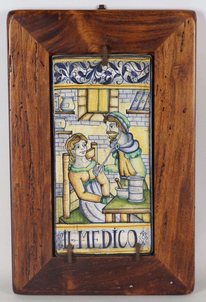"Il medico", placca in maiolica Castelli smaltata e policroma