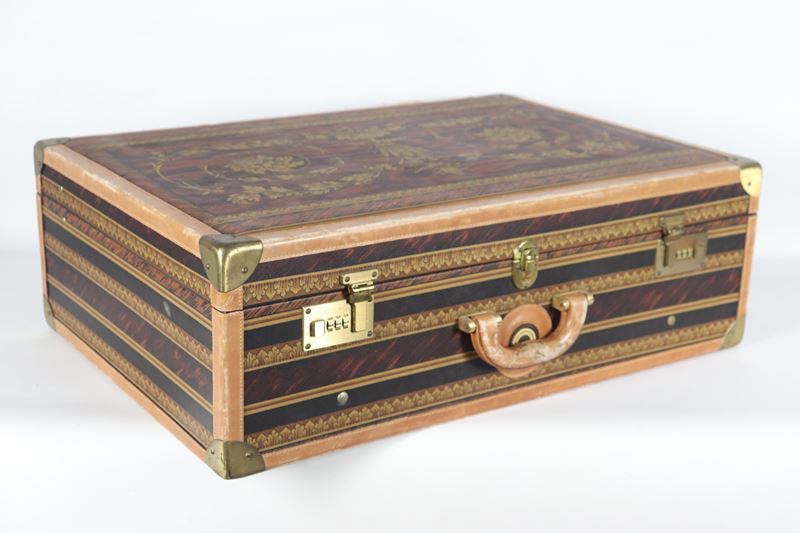 Valigia disegnata da Marta Marzotto in tela e cuoio