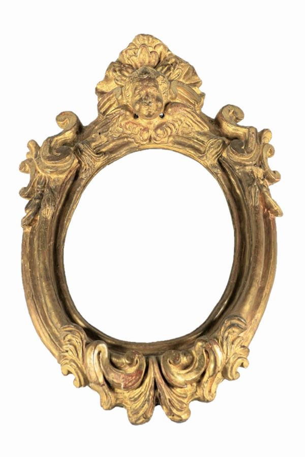 Oval frame in golden terracotta