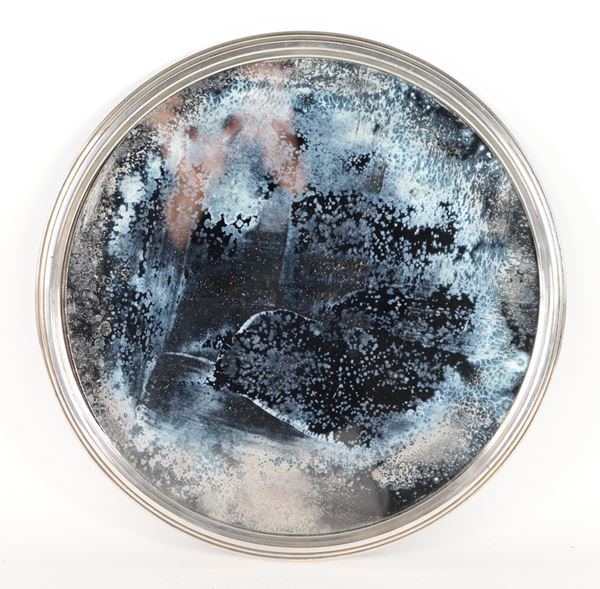 Round wooden centerpiece with silver edge and mercury mirrored bottom