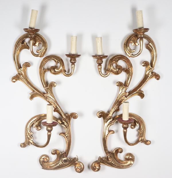 Pair of gilded and carved wood wall lamps with Louis XV motifs, 3 lights each