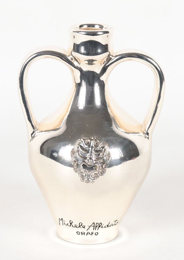 Small amphora vase by the goldsmith Michele Affidato, in galvanized marble dust composite coated in silver, with application of a 925 silver Apotropaic Mask