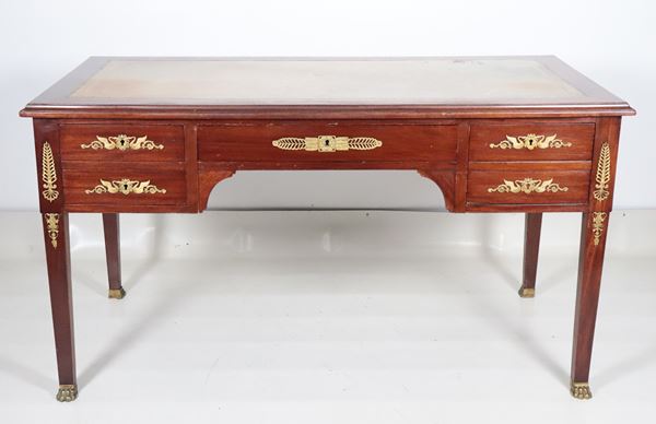 Antique French Napoleon III mahogany center desk, Empire style with neoclassical bronze friezes and trim