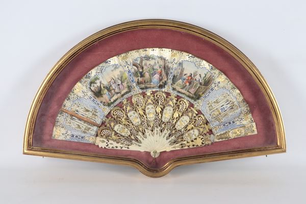 Antique fan with colorful decorations featuring romantic scenes