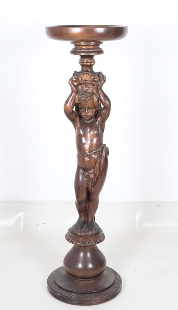 Walnut plant stand with Cherub sculpture