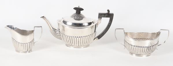 Queen Victoria era tea set in chiseled and embossed silver (3 pieces), 530 gr.