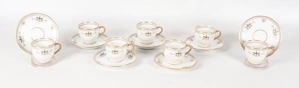 Lot of seven Richard Ginori coffee cups in white porcelain, with Empire motif decorations