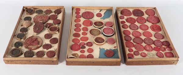 Collection of red lacquer seals, some with cracks and defects 