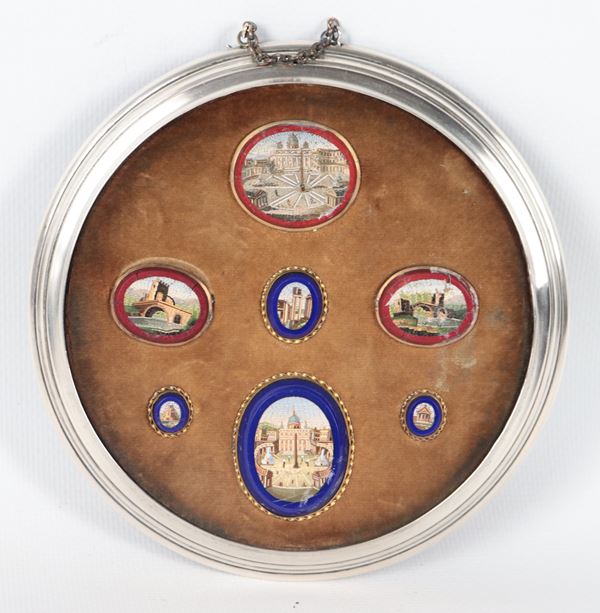 Ancient lot of seven small Roman micromosaics with views of St. Peter's, the Forum, Ponte Salario and Ponte Nomentano, mounted in a round silver frame with a velvet background 