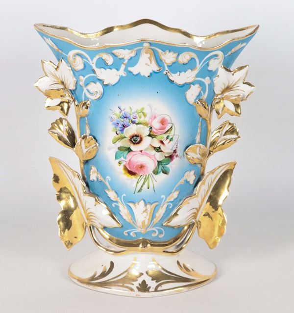 Neapolitan vase in a Louis Philippe period porcelain, with polychrome floral decorations on a light blue background and pure gold