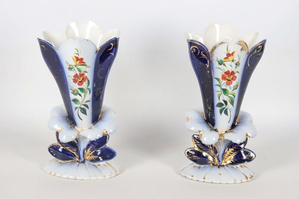 Pair of antique French Louis Philippe vases in white and cobalt blue porcelain, with polychrome floral decorations