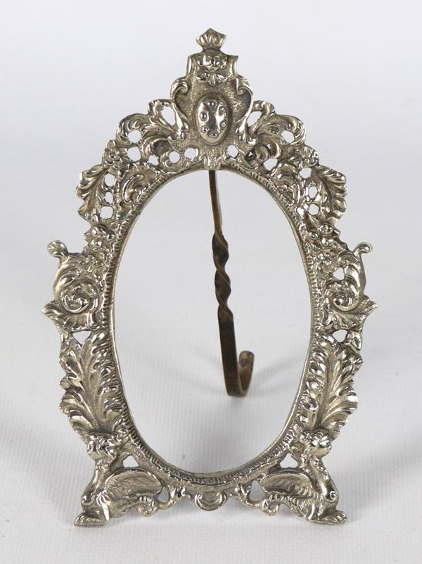 Antique oval miniature frame in silver-plated bronze, embossed and chiseled