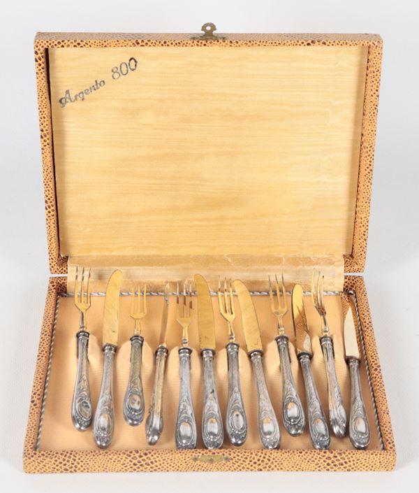 Dessert cutlery set with chiseled and embossed silver handles: six forks and six knives
