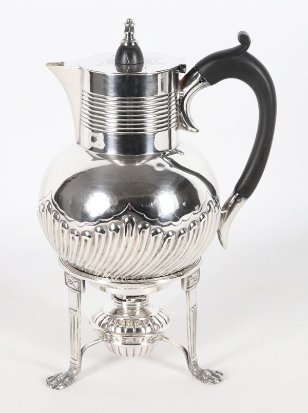 Antique English coffee pot in Sheffield with a spirits dispenser underneath 