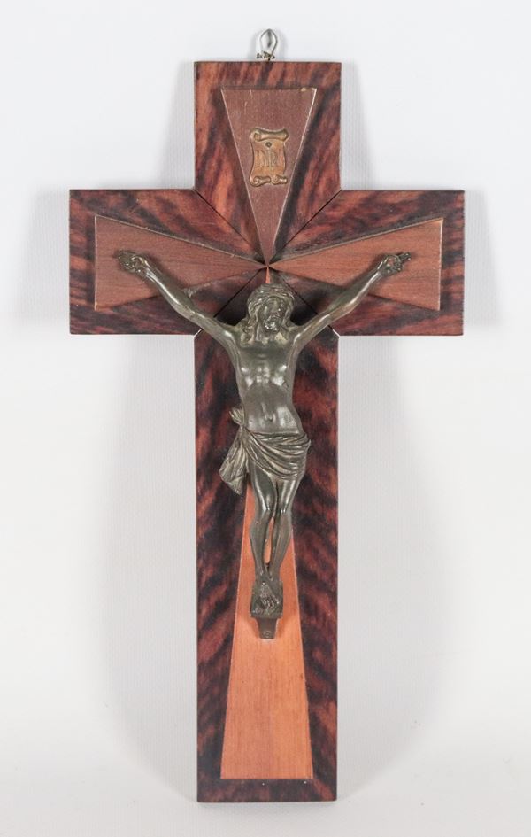 Small bronze crucifix with wooden cross