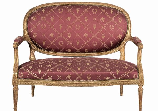 Sofa in gilded wood