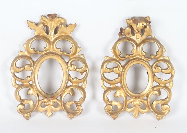 Pair of small antique gilded wood portrait frames with Louis XV motifs